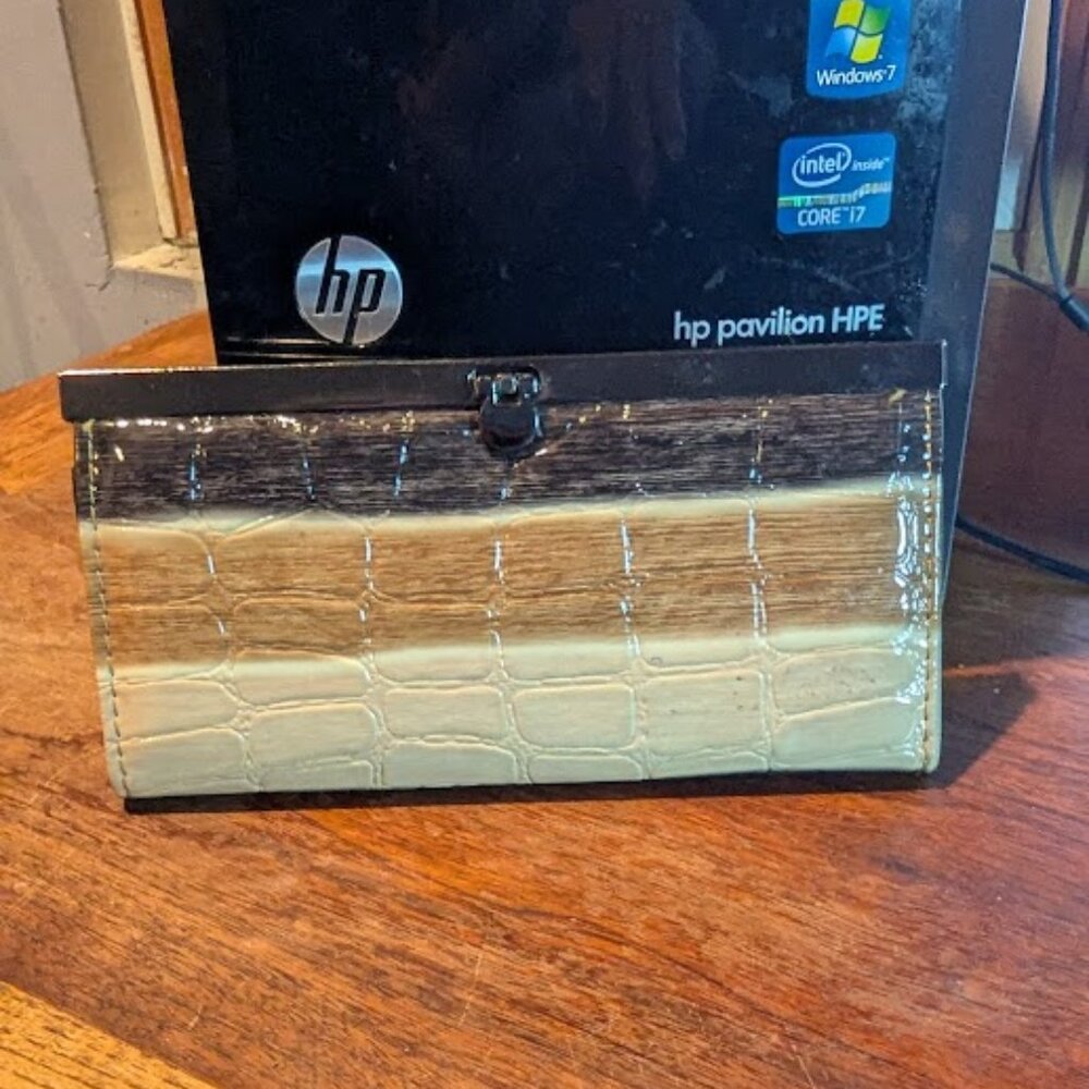 cream and brown clutch